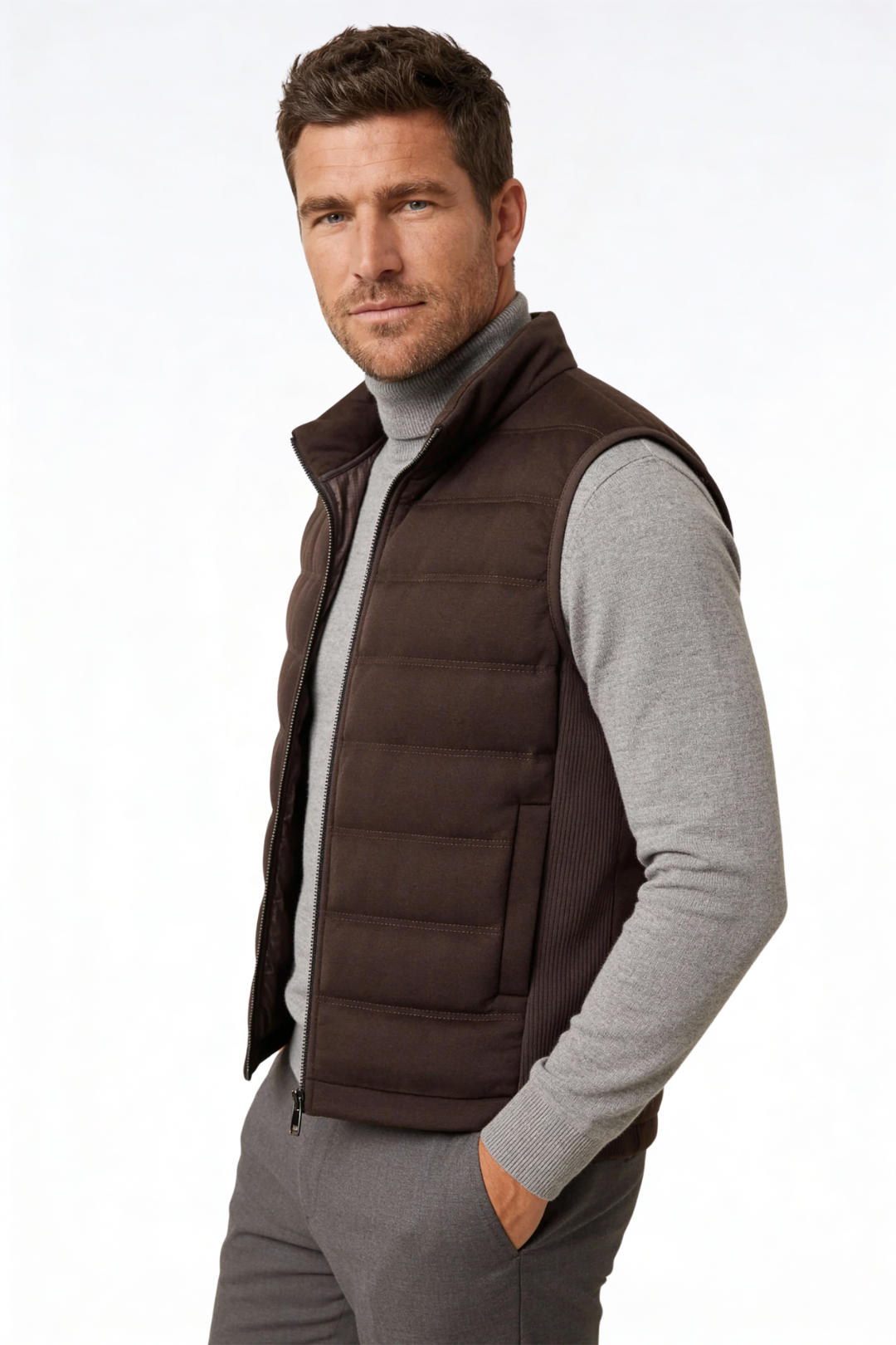 Man wearing the brown insulated puffer vest of Lavencio