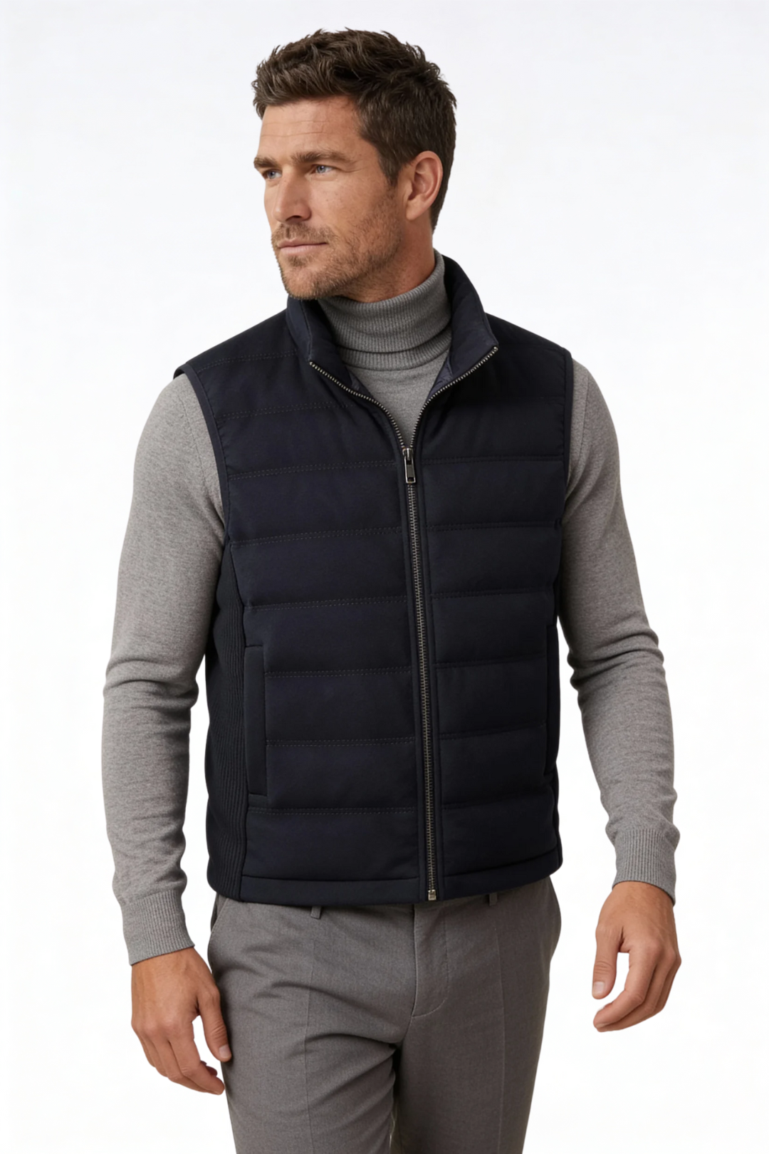 Man wearing the black insulated puffer vest of Lavencio