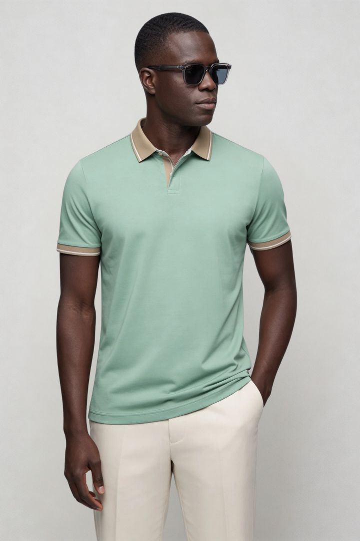 Men’s tailored summer polo shirt with contrast collar and breathable stretch fabric for modern casual style in sage green front view
