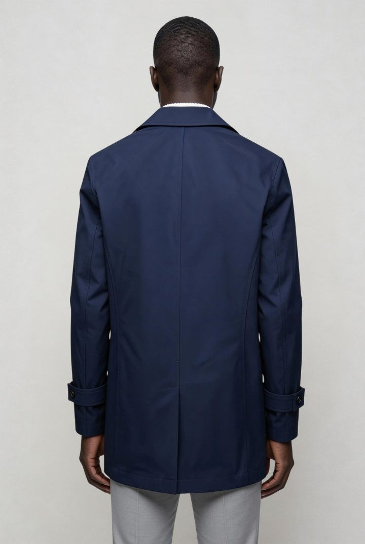 Men’s navy double breasted trench coat back view