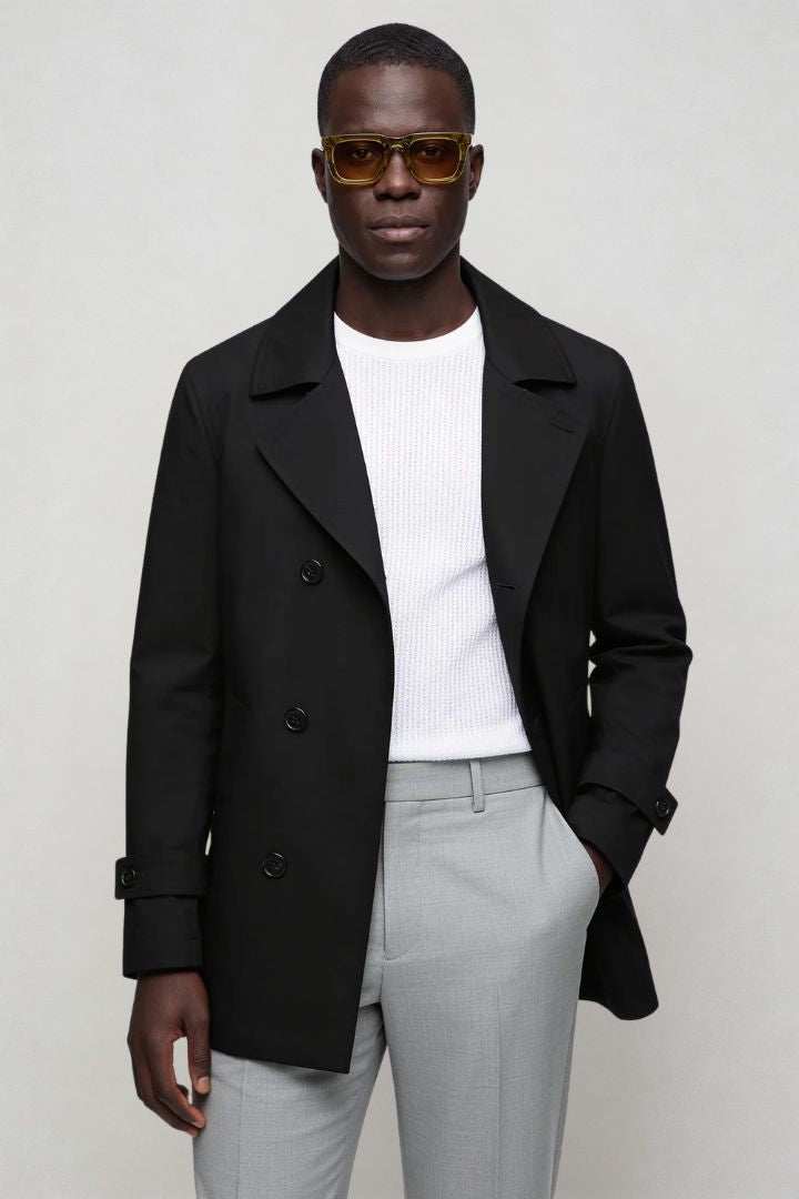 Men’s black double breasted trench coat front view