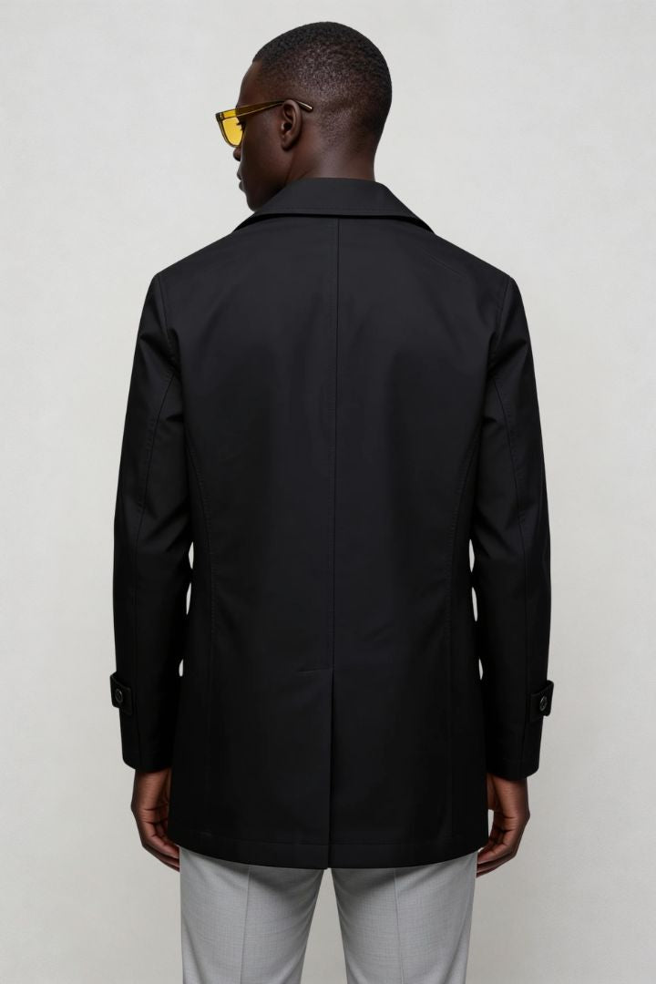 Men’s black double breasted trench coat back view
