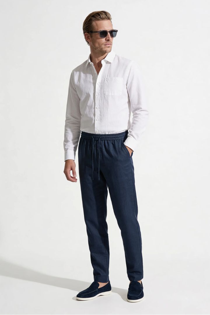 Men’s navy linen resort set with relaxed linen shirt and drawstring pants lightweight summer outfit front view