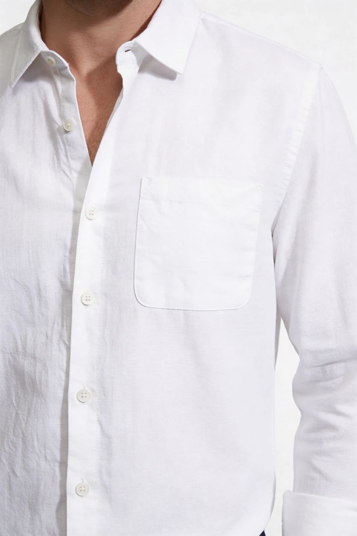 Men’s navy linen resort set with relaxed linen shirt and drawstring pants lightweight summer outfit close-up