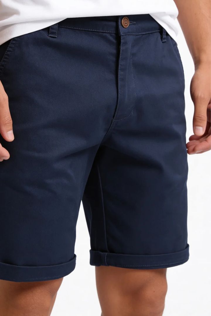 Men’s navy cotton chino shorts with tailored fit designed for breathable summer comfort close-up