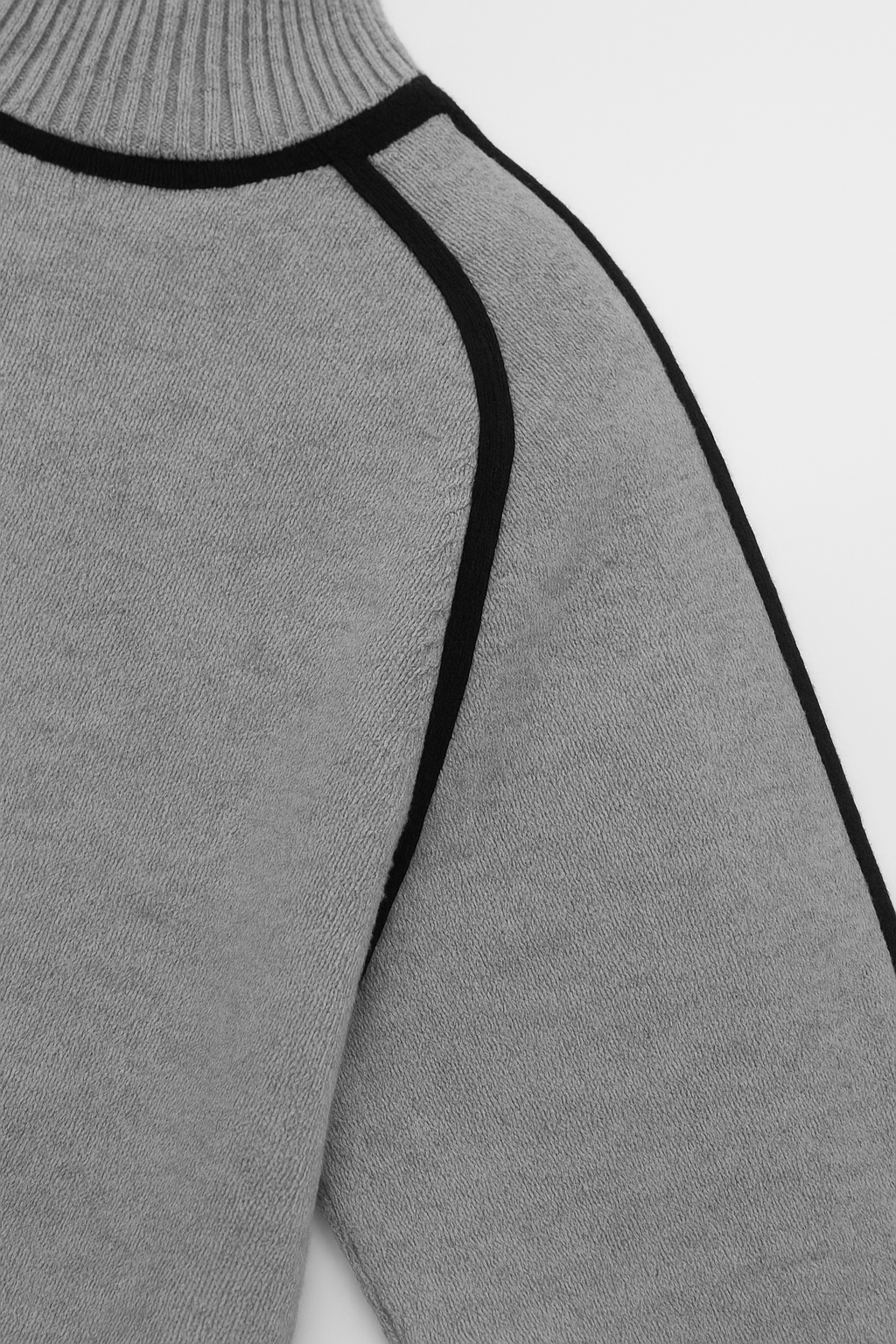 Gray sweater with black trim on a white background