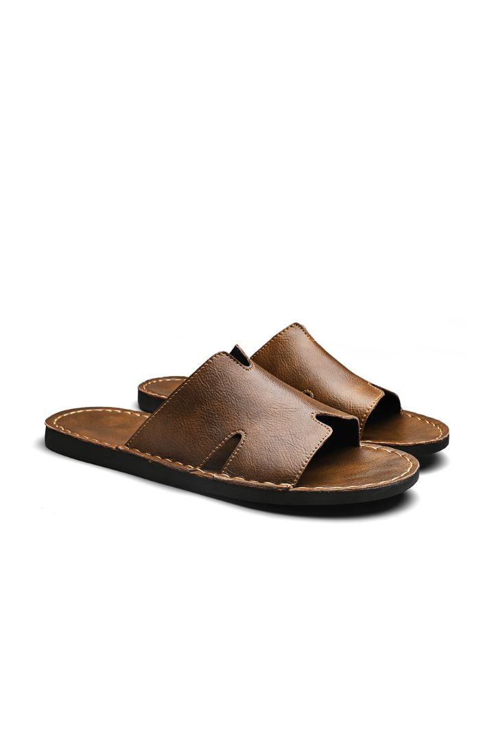 Men’s brown minimalist leather slide sandals with cowhide upper and stitched sole design