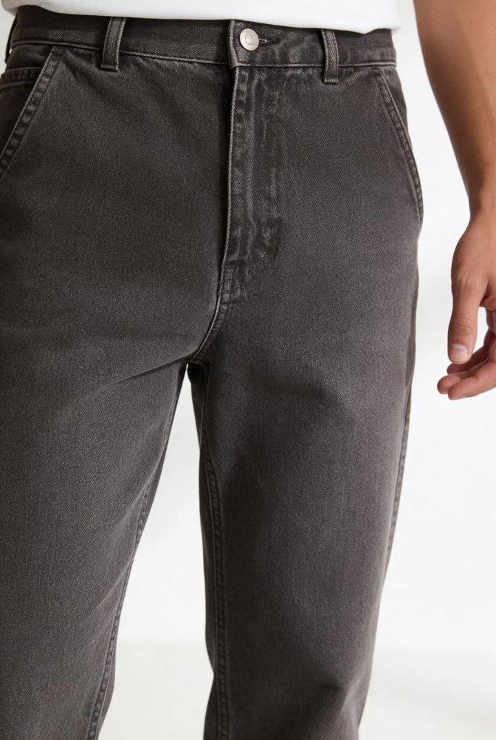 Men’s straight leg 100% cotton jeans in washed gray denim close up