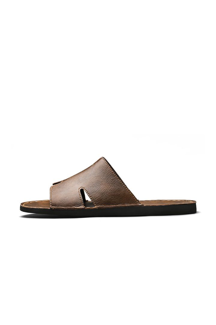 Men’s brown minimalist leather slide sandals with cowhide upper and stitched sole design side view