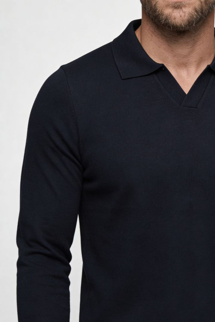 Men’s navy long sleeve knit polo shirt with tailored fit and structured collar close up