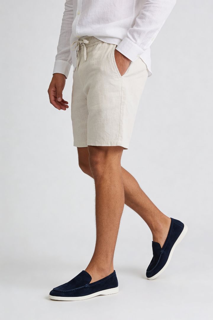 Men’s 100% linen sand drawstring shorts with elastic waist and relaxed summer fit side view