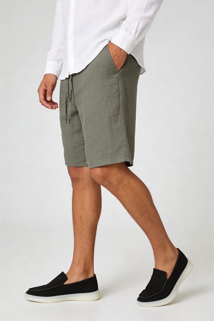 Men’s 100% linen green drawstring shorts with elastic waist and relaxed summer fit side view