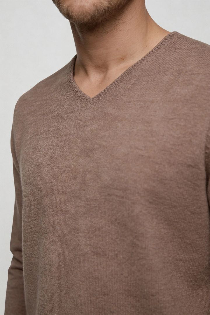 Men’s taupe lightweight V-neck knit sweater with ribbed cuffs and clean slim silhouette close-up