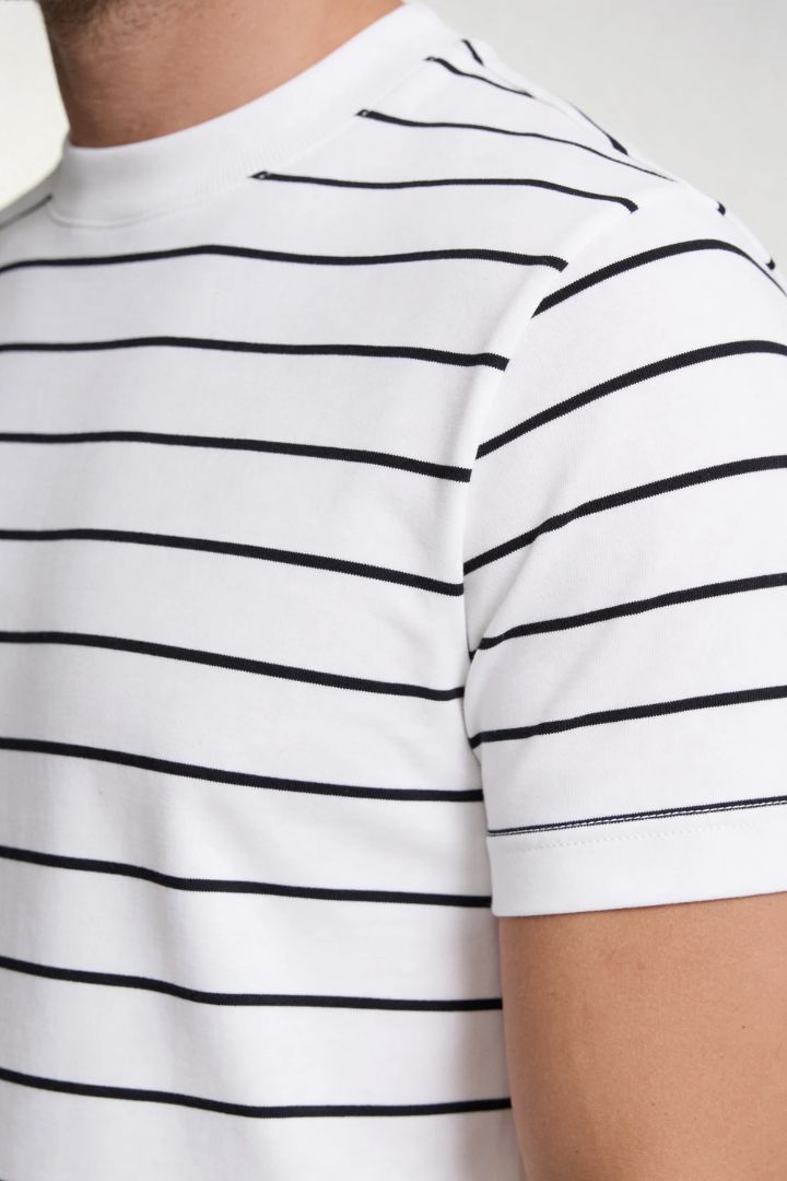 Lavencio Men’s slim fit textured cotton knit short sleeve t-shirt in white close-up