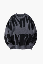 Gray sweater with black abstract pattern on a white background