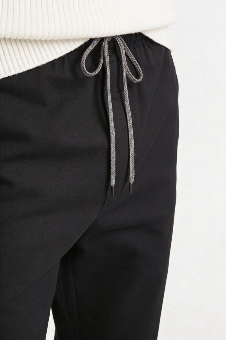 Men’s Black Cotton Drawstring Trousers – close-up view, clean everyday trousers