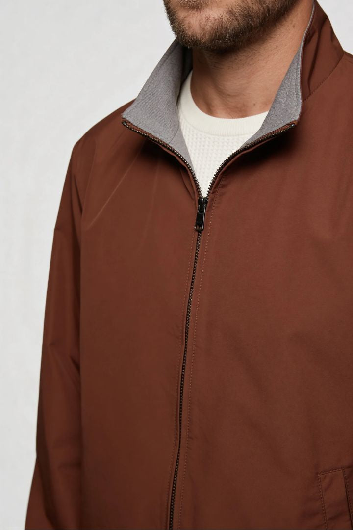 Men’s lightweight reversible zip up jacket with slim fit modern casual design close up
