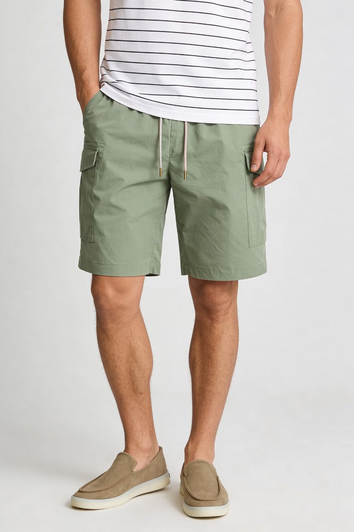 Men’s sage green utility cargo shorts with drawstring waist and side cargo pockets in lightweight fabric