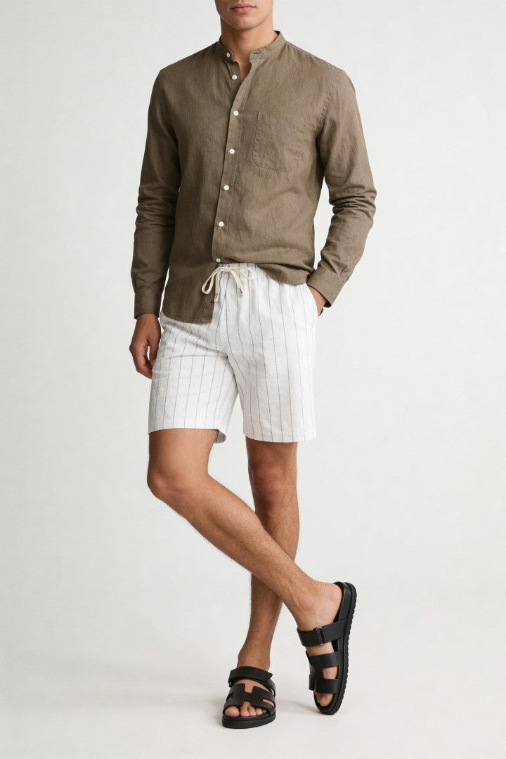 Men’s white linen stripe shorts with drawstring waist and relaxed breathable summer fit model shoot