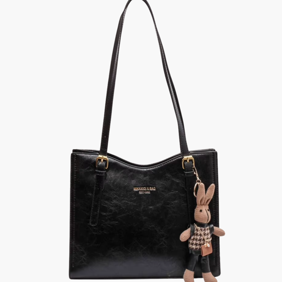 Black vegan-leather women’s shoulder bag—medium tote with long straps, front view.