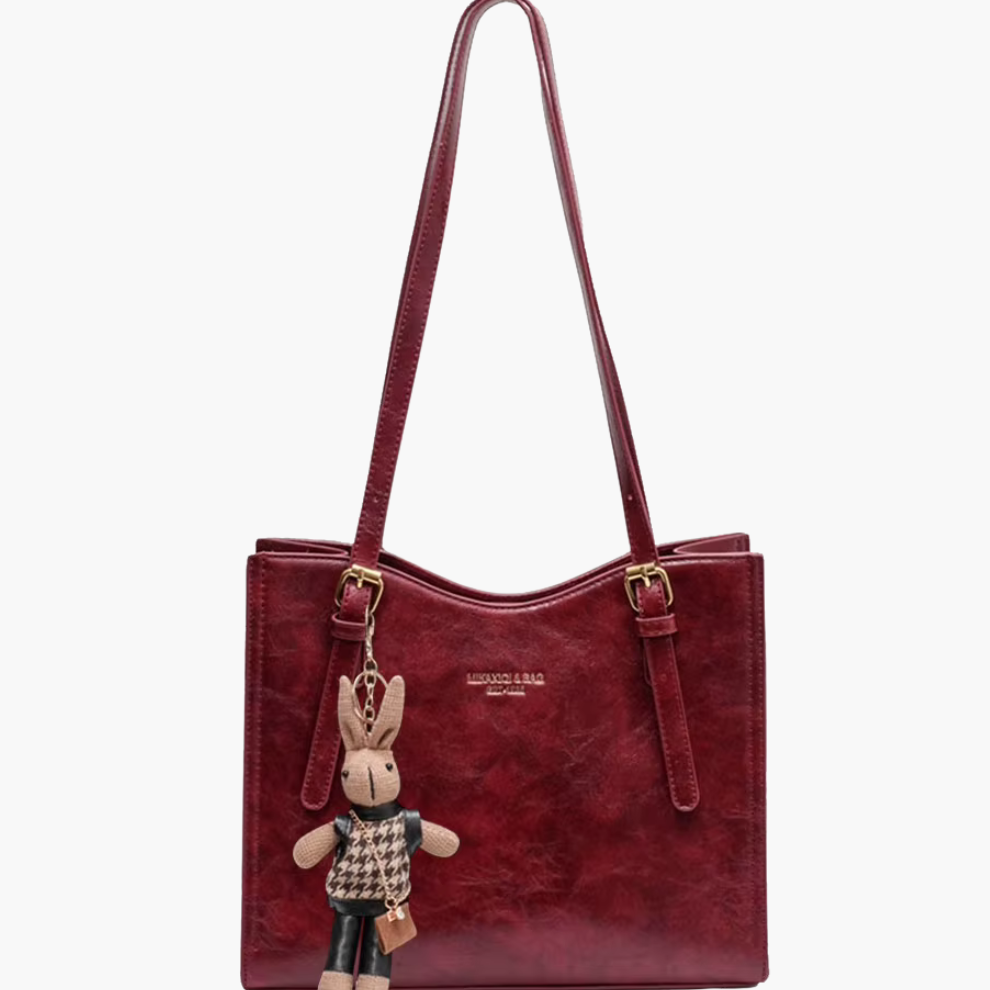 Burgundy vegan-leather women’s shoulder bag—medium tote, front view.