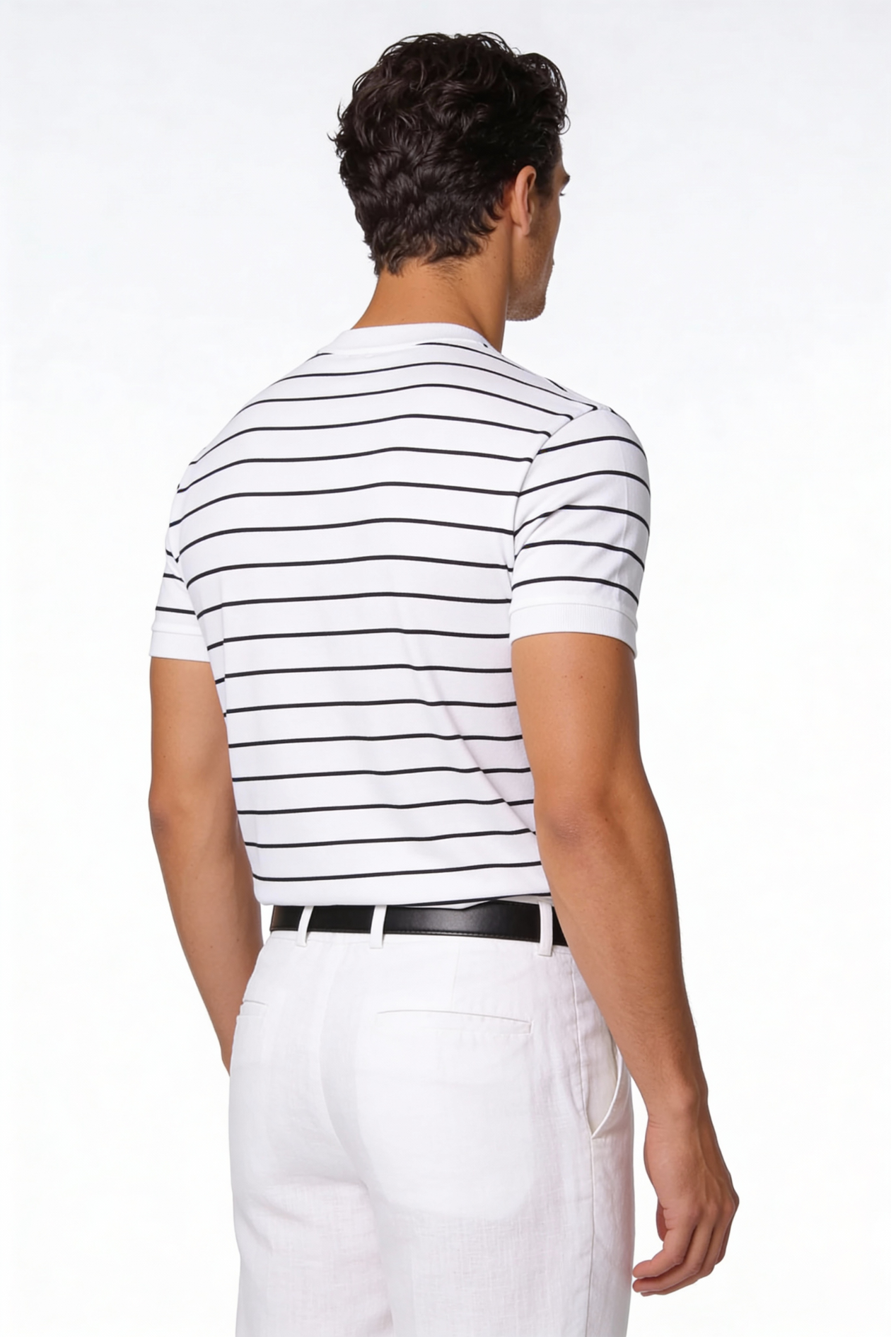 Man wearing the Blake Striped Lyocell T-Shirt with a clean striped design and lightweight fabric in a studio setting.