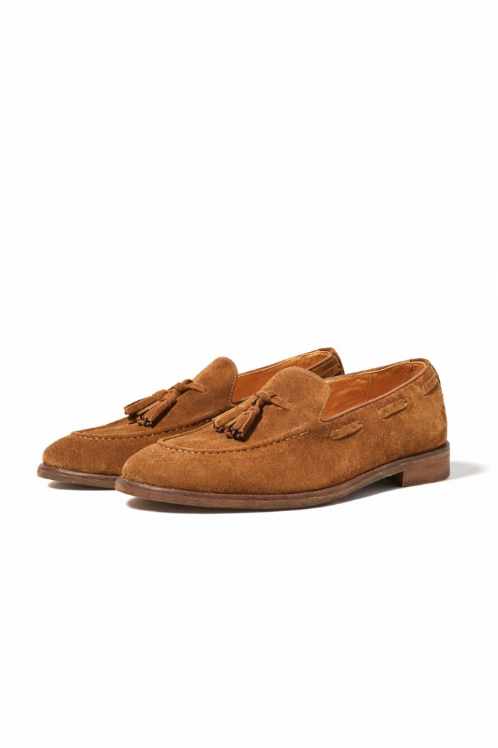 Marcellin suede tassel loafers for men in cognac suede with classic tassel detail and leather lining front view