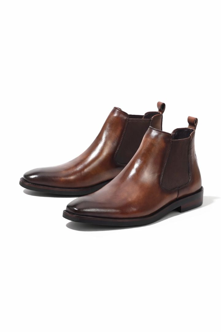 Premium men’s leather Chelsea boots in brown with elastic side panels and sleek slip-on ankle boot design