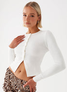Side view—black ribbed cropped button top for women.