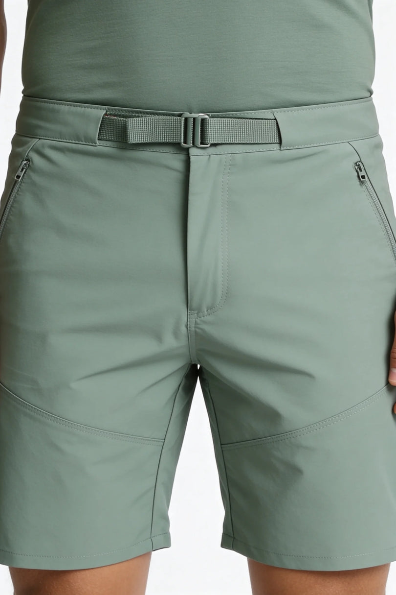 Men’s green lightweight performance shorts quick dry stretch breathable utility shorts with zip pockets close-up