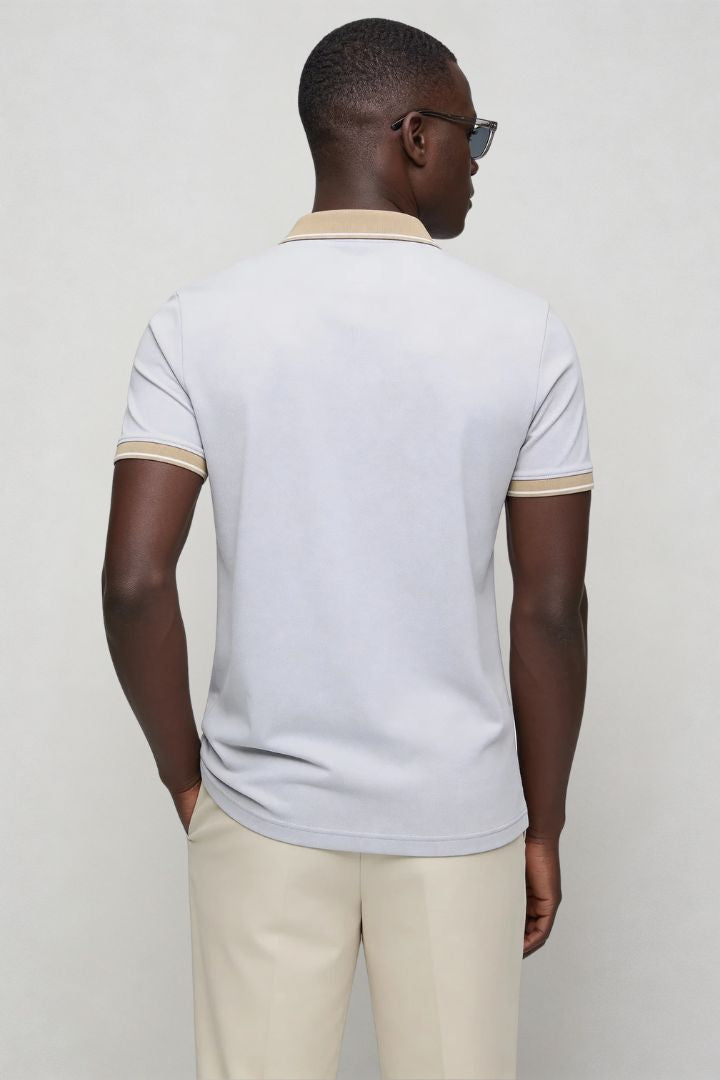 Men’s tailored summer polo shirt with contrast collar and breathable stretch fabric for modern casual style in gray back view