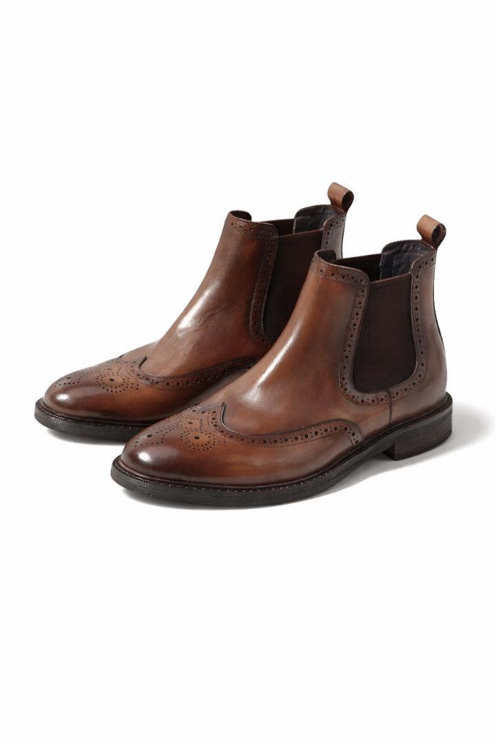 Men’s leather brogue Chelsea boots in brown with wingtip detailing and classic slip-on ankle boot silhouette