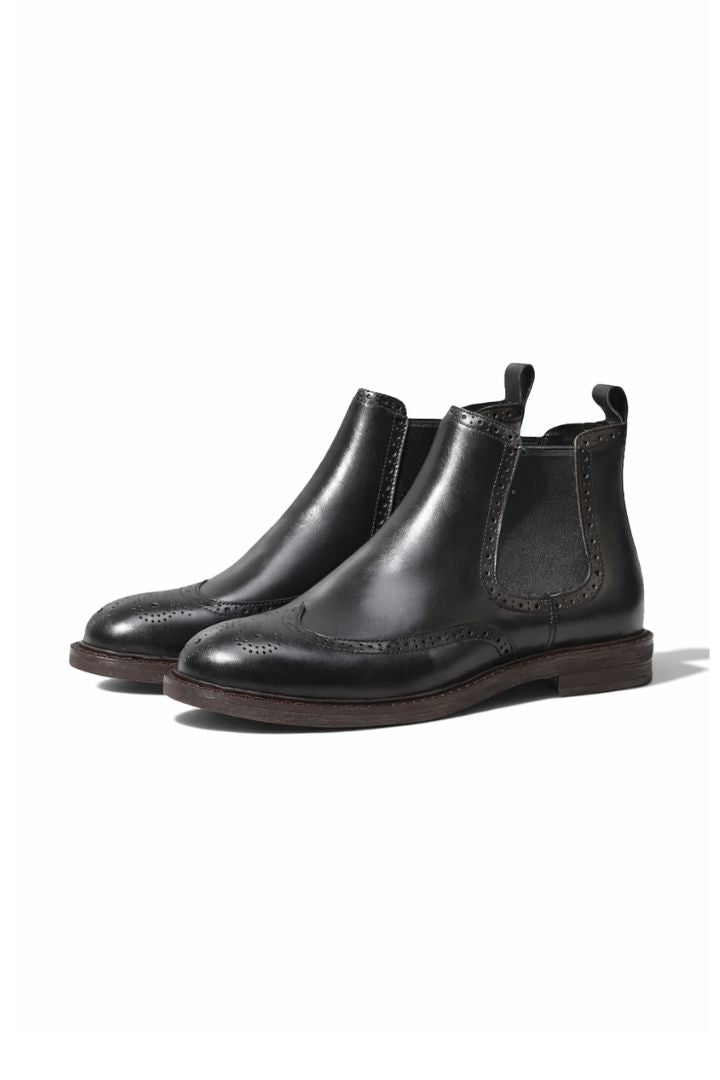 Men’s leather brogue Chelsea boots in black with wingtip detailing and classic slip-on ankle boot silhouette