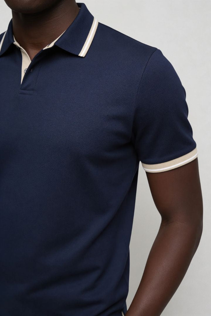 Men’s tailored summer polo shirt with contrast collar and breathable stretch fabric for modern casual style close up view 