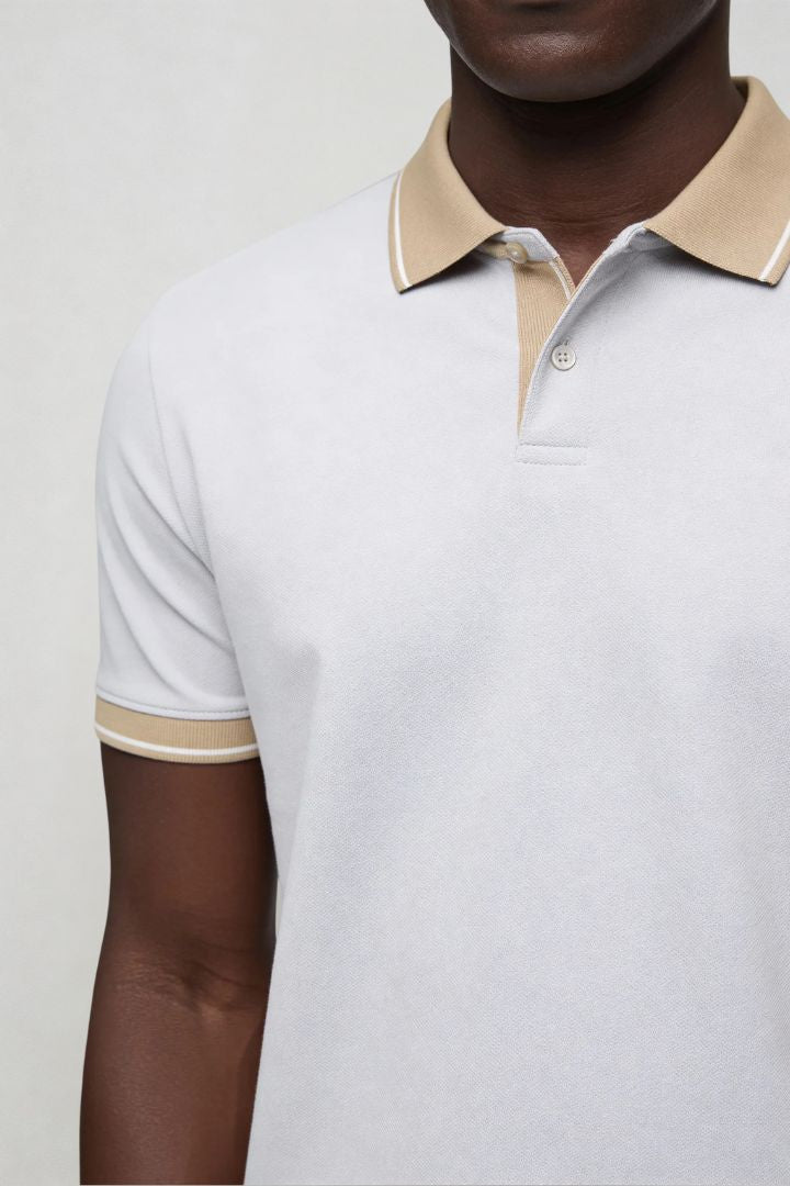 Men’s tailored summer polo shirt with contrast collar and breathable stretch fabric for modern casual style in gray close-up