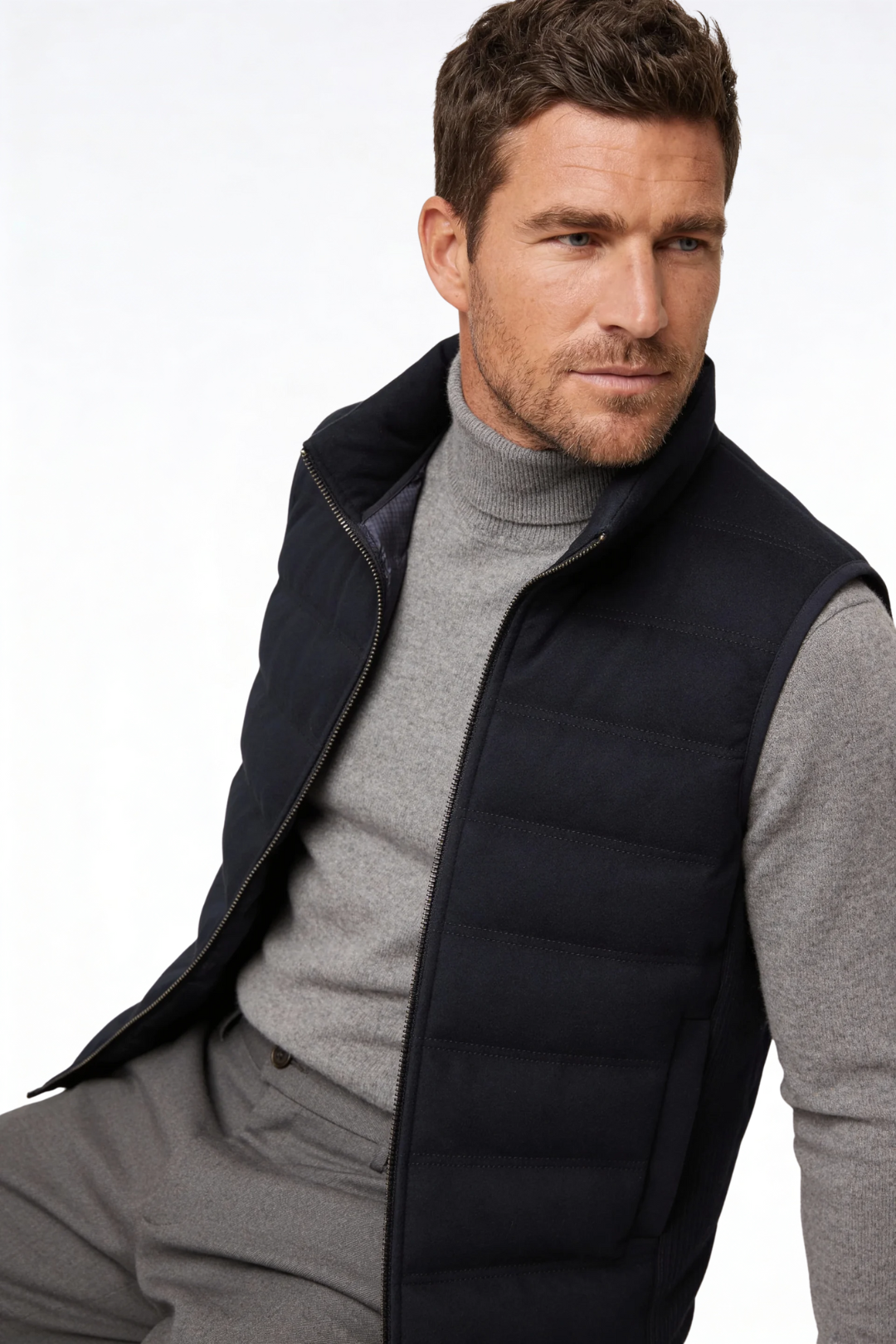 Man wearing the black insulated puffer vest of Lavencio