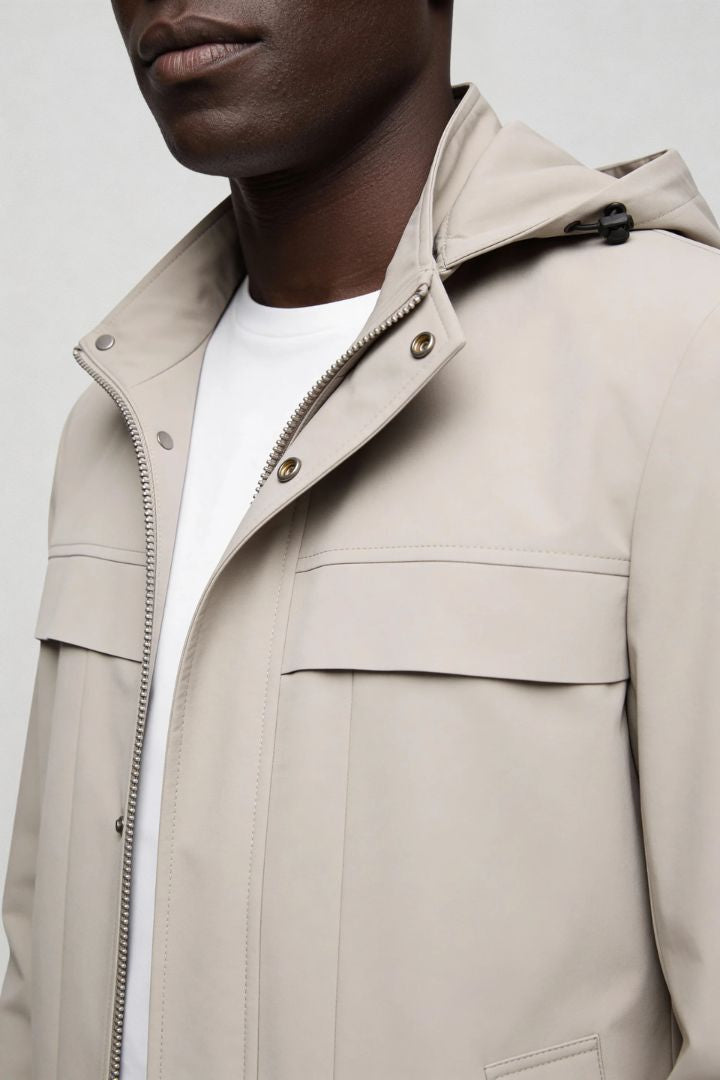 Men’s beige lightweight hooded polyester jacket spring fall outerwear close-up