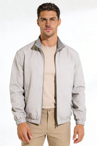 Men wearing a premium reversible gray lightweight jacket with a clean, tailored fit, designed for versatile everyday layering.