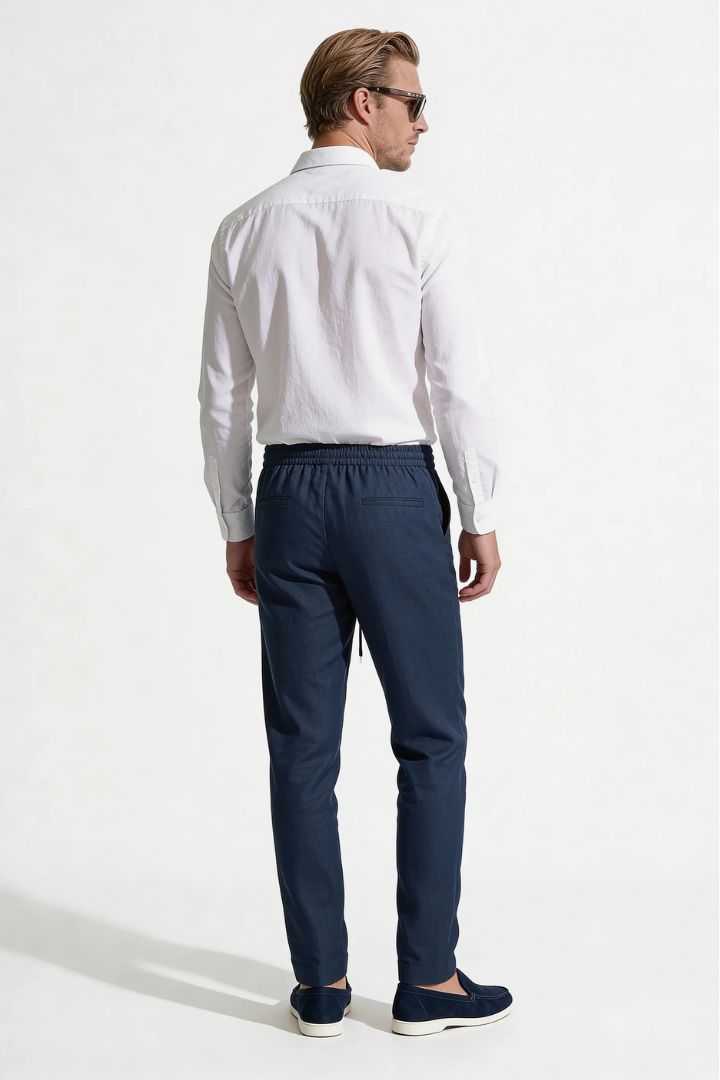 Men’s navy linen resort set with relaxed linen shirt and drawstring pants lightweight summer outfit back view