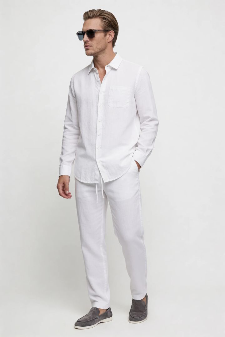 Men’s white linen resort set with relaxed linen shirt and drawstring pants lightweight summer outfit front view