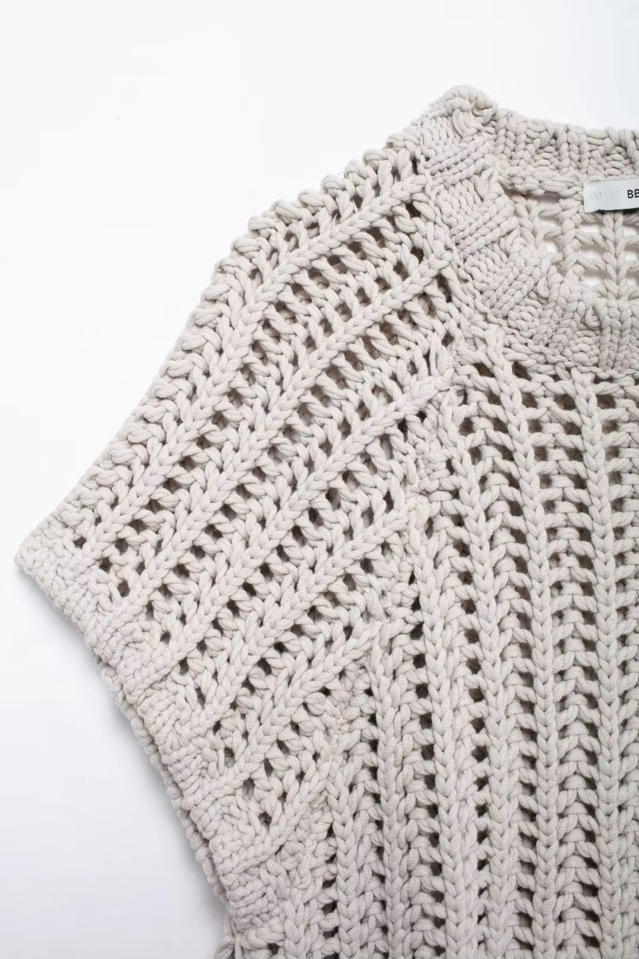 Close-up of a beige to on a white background