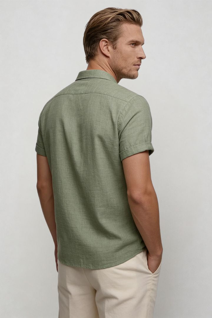 Men’s linen blend short sleeve Riviera shirt designed for breathable summer comfort in green side view