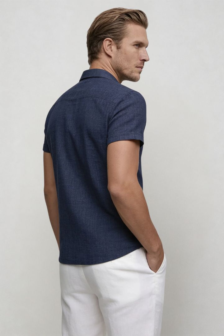 Men’s linen blend short sleeve Riviera shirt designed for breathable summer comfort in navy back view