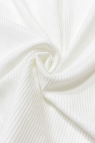 Close-up of white fabric with a subtle texture