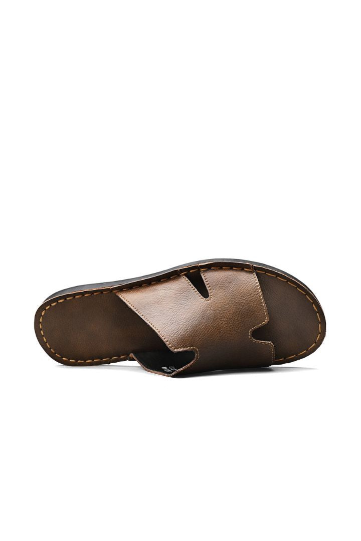 Men’s brown minimalist leather slide sandals with cowhide upper and stitched sole design upper view