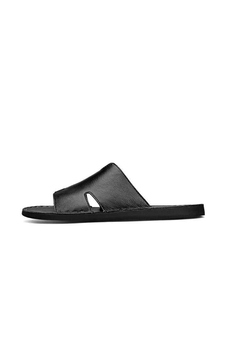 Men’s black timeless leather slide sandals with cowhide upper and stitched sole design side view