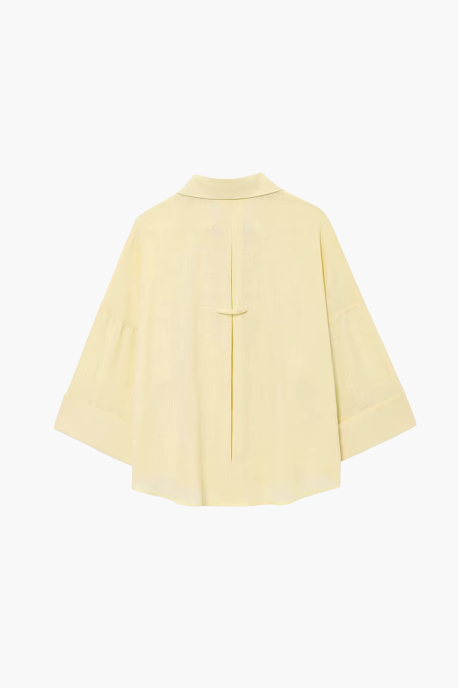 Light yellow shirt on a white background