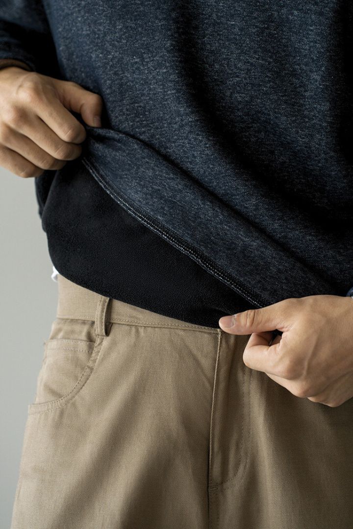 Men’s navy cotton quarter zip sweater with structured collar and ribbed cuffs details