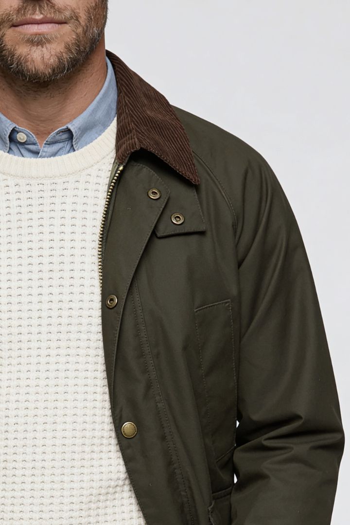 Men’s cotton field jacket with corduroy collar and utility pocket design close-up