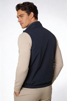 Men wearing a premium reversible lightweight vest with a clean, tailored fit, designed for versatile everyday layering.
